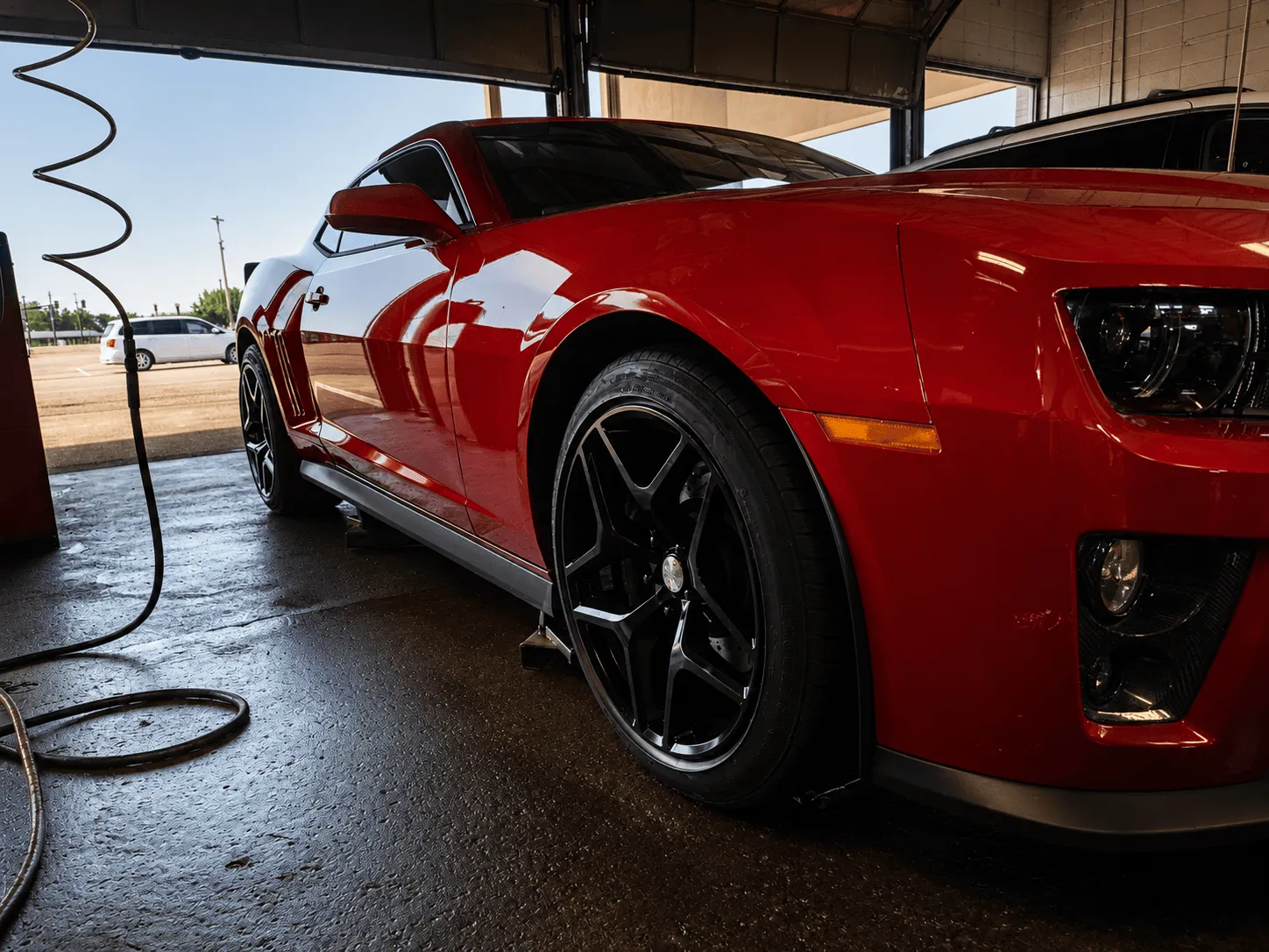 New tires fitted on a car at Thomas Tire in Pearl, MS
